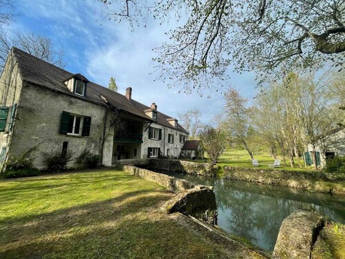 Old mill with river - a haven of peace in the heart of nature