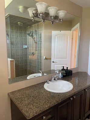 Jetted bath, hair dryer, towels, soap