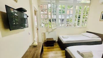 Basic Room | 1 bedroom, iron/ironing board, free WiFi, bed sheets