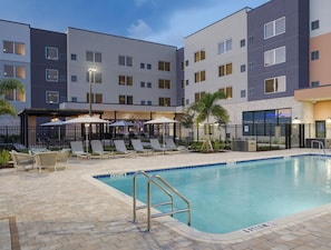 Outdoor pool, open 9:00 AM to 10:00 PM, pool umbrellas, sun loungers