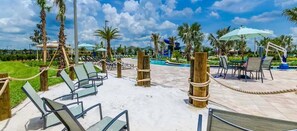 Outdoor dining - Brand New High End 9BR Villa in Storey Lake Resort (Kissimmee)