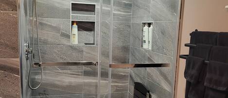 Hair dryer, towels, soap, shampoo