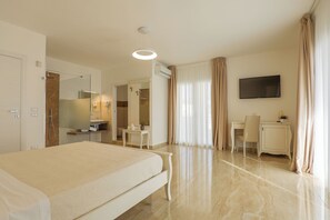 Deluxe Double Room, Garden View | Premium bedding, down comforters, minibar, in-room safe - Dimore Relais - Suite Garden Breakfast (Porto Cesareo)