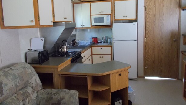Appartement Confort | Cuisine privée | Cafetière/bouilloire, grand réfrigérateur, micro-ondes, four