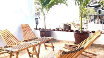 Cobertura design, 2 quartos | Terraço/pátio