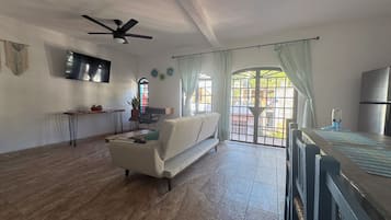 Traditional Condo, 1 Bedroom, Non Smoking, Private Bathroom | Living area | 55-inch Smart TV with digital channels, streaming services