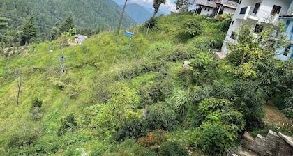 Delightful 4-bedroom house in Ramgarh with Orchard, green forest & Himalyan view