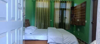 Delightful 4-bedroom house in Ramgarh with Orchard, green forest & Himalyan view