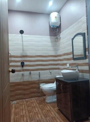 Bidet, towels, soap, shampoo