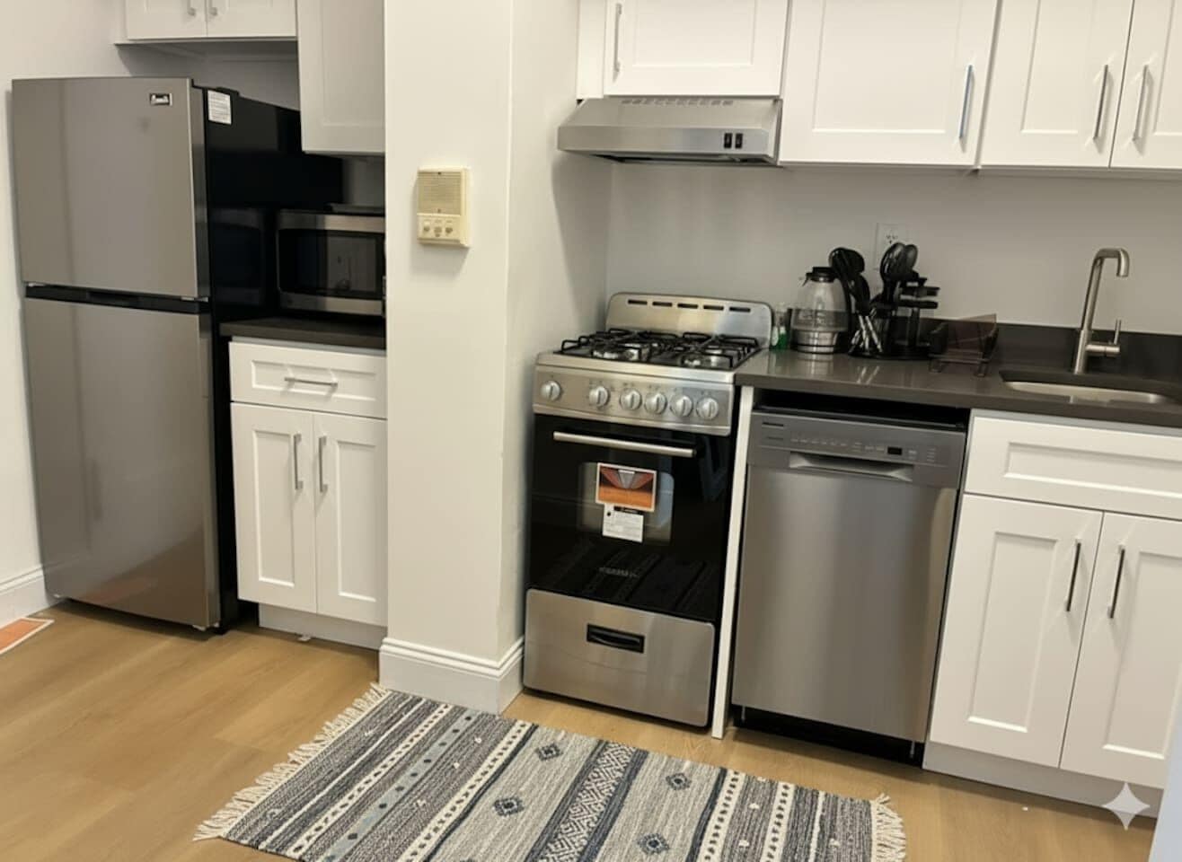 Coffee/tea maker, fridge, microwave, oven