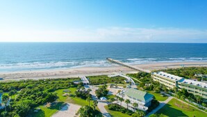 A resort with a beach view, a pier, and a well-maintained lawn area. - Top Floor condo, Pool, across from Beach & Pier Access! - 310C Oceanside (Isle Of Palms)