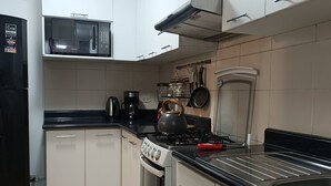 Mikrobølgeovn, ovn, vannkoker og brødrister