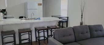 Surrounded by sweetgum and maple trees, this house is perfect for some R & R.