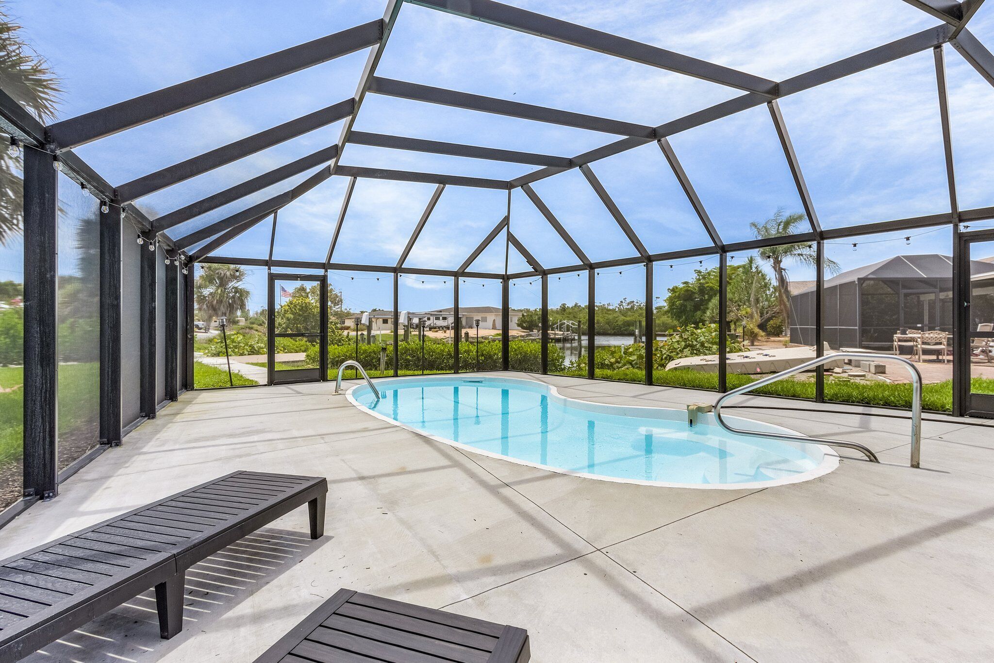 Coastal Comfort: Canal-Front Home w/ Pool & Dock