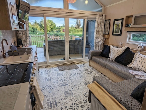 Cabana família, várias camas, cozinha, vista para o jardim | Roupas de cama premium, cortinas blackout, ferros/tábuas de passar roupa