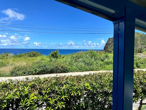 Dormitorio compartido básico, vista al océano | Terraza o patio