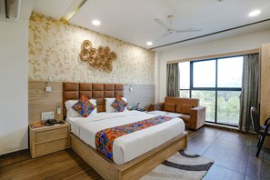 Premium Room | Egyptian cotton sheets, premium bedding, in-room safe, free WiFi - Fabhotel Asiana (Ahmedabad)