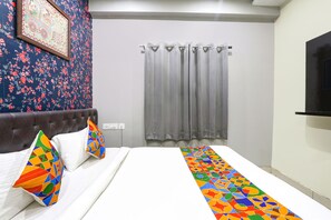 Egyptian cotton sheets, premium bedding, in-room safe, free WiFi - FabHotel Galaxy Suites (Hyderabad)