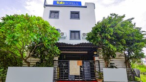 A building with a sign reading "fab hotels" at the top. - Fabhotel New Shraddha Inn (Nagpur)