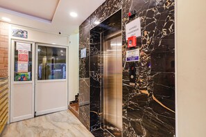 Lift - Fabhotel Sun Lux Grand Residency (Vanur)