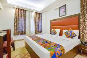 Habitación Deluxe | Sábanas de algodón egipcio y ropa de cama de alta calidad 