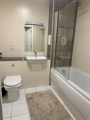 Hair dryer, towels, soap, shampoo