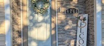 Elegant, charming, serene, & delightful home with huge fenced yard close to I90!