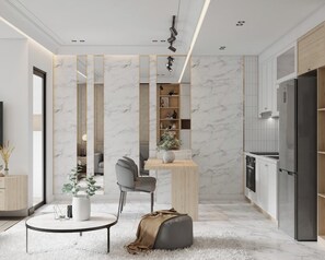 Apartamento luxo | Área de estar | TV de tela plana 40 polegadas com canais via satélite, smart speakers