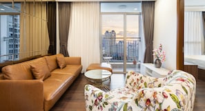 Basic Apartment, 3 Bedrooms, Balcony, City View | Living area | 40-inch flat-screen TV with satellite channels, smart speakers - Landmark 81 Luxury - SaigonHomes (Ho Chi Minh City)