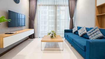 Basic Apartment, 2 Bedrooms, 2 Bathrooms, City View | Living area | 40-inch flat-screen TV with satellite channels, smart speakers