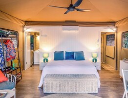 Deluxe Suite (Tent 3) | Premium bedding, pillowtop beds, laptop workspace, rollaway beds