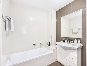 Hair dryer, towels, soap, shampoo