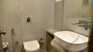 Shower, rainfall showerhead, towels, soap