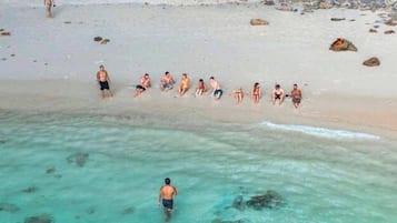 On the beach, white sand