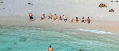 On the beach, white sand