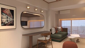 A modern room with a desk, chair, sofa, ottoman, and a large window. - illi Tas Shinjuku (Tokyo)