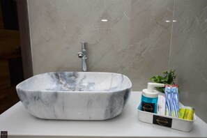 Bidet, towels, soap, shampoo