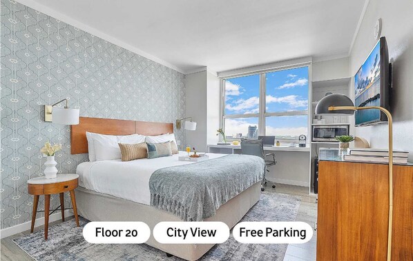 Tabla de planchar con plancha, cuna de viaje, wifi y ropa de cama 