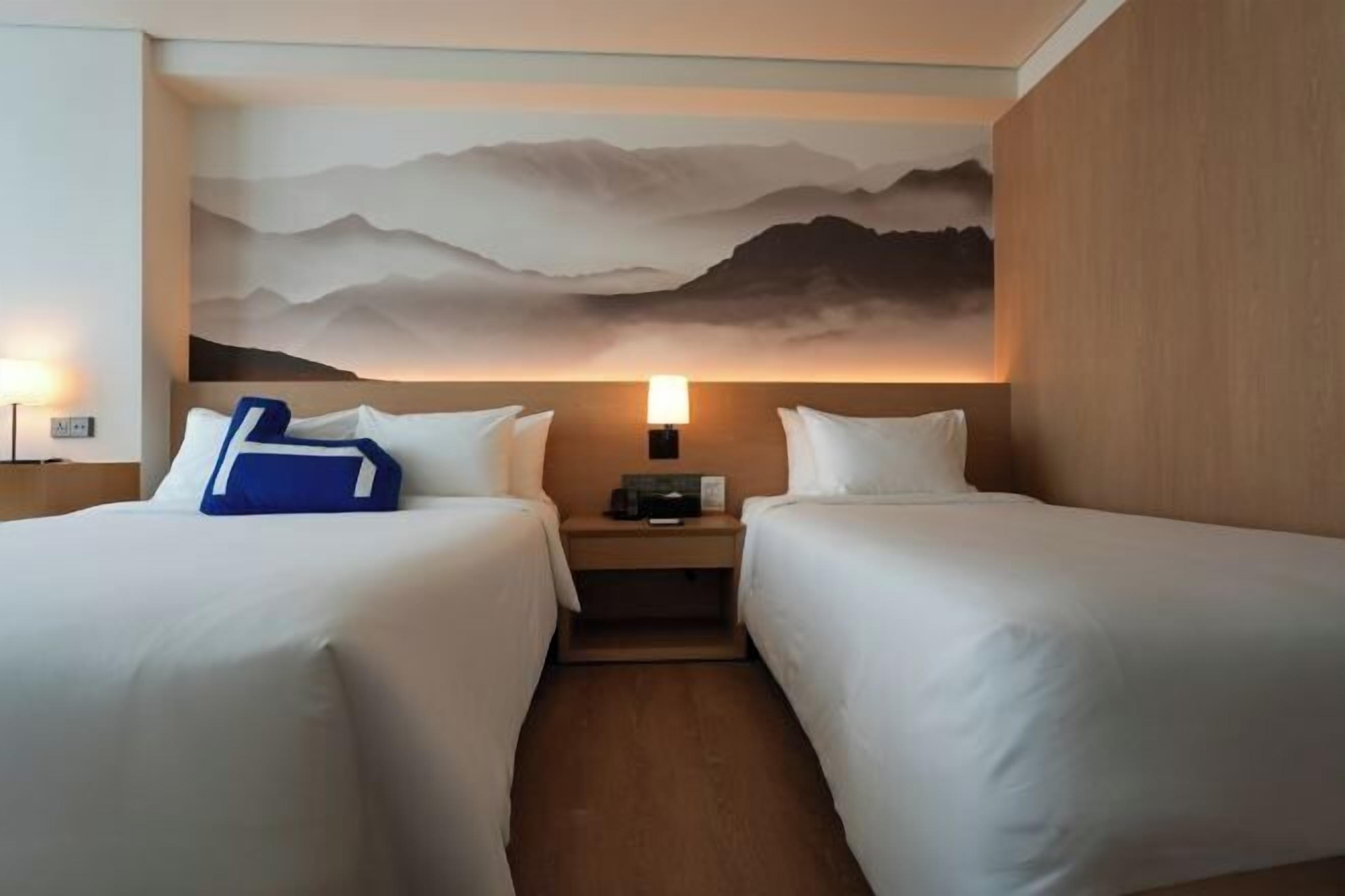 Down duvets, pillow-top beds, minibar, in-room safe