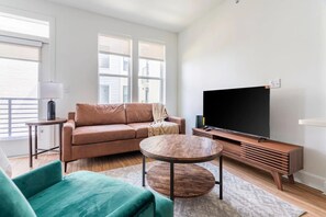 Studio, Balcony | Living area | 50-inch Smart TV with digital channels - The Weaver (Austin)