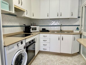 Fridge, microwave, oven, coffee/tea maker