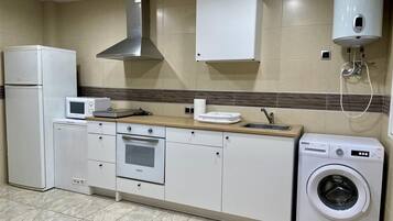 Fridge, microwave, coffee/tea maker, toaster