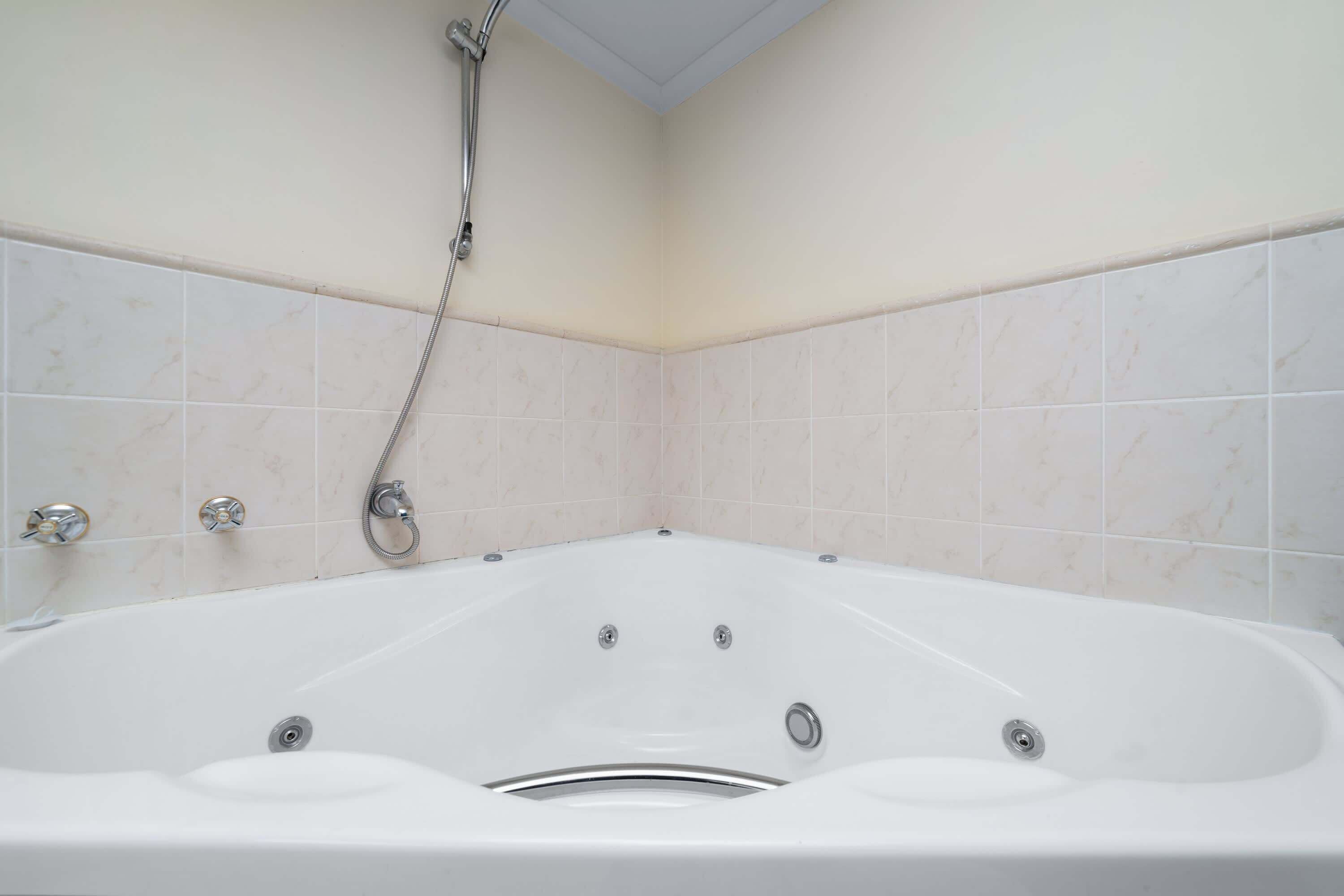 Shower, hair dryer, towels, shampoo