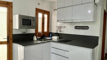 Fridge, microwave, coffee/tea maker, toaster