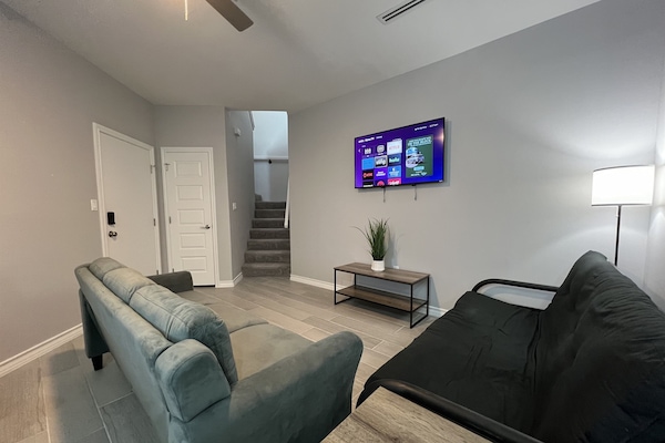 Living Room with Smart TV and Futon