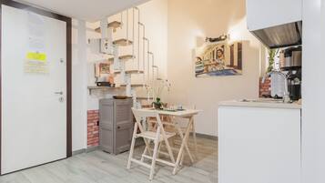 Apartment | Private kitchen | Electric kettle, dining tables