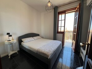 2 habitaciones, tabla de planchar con plancha, wifi y ropa de cama 