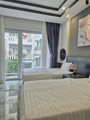 Deluxe Room | Minibar, desk, laptop workspace, soundproofing - Galang Hotel (Ho Chi Minh City)