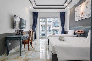Deluxe Room, City View | Minibar, desk, laptop workspace, soundproofing - Galang Hotel (Ho Chi Minh City)