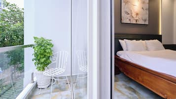 Deluxe Room, Non Smoking, City View | Minibar, desk, laptop workspace, soundproofing